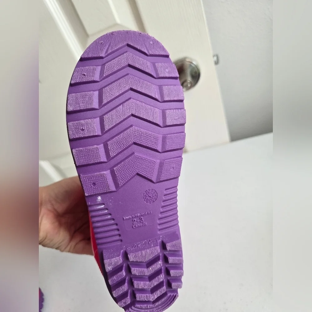 Vibrant Pink Rain Boots with Purple Soles